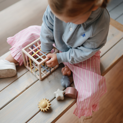 Mushie Elastic Shape Sorter