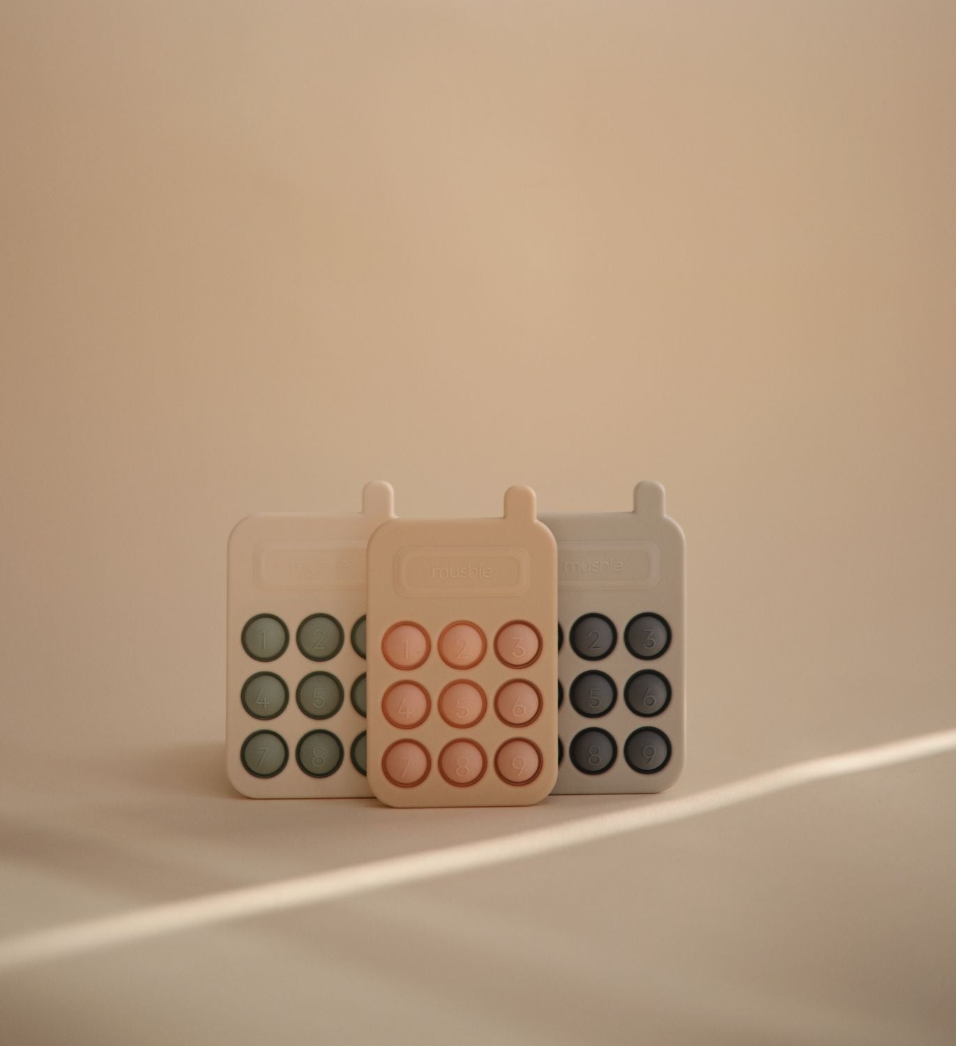 MUSHIE Phone Press Toy